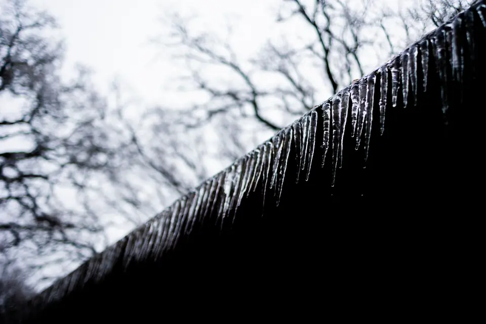 Icicles hanging from the edge of a roof